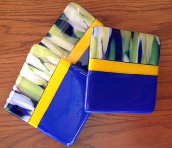 blue, yellow and white coasters